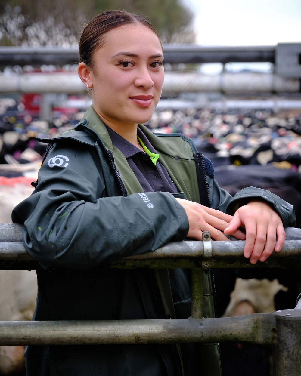 Green coloured Betacraft Technidairy Parka on blurry background
