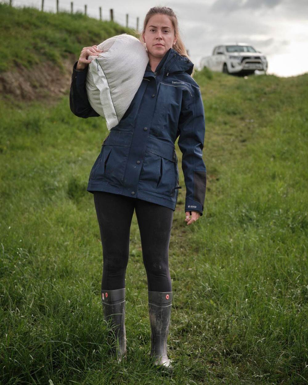 Dark Navy coloured Betacraft Womens Rover Jacket on farm background