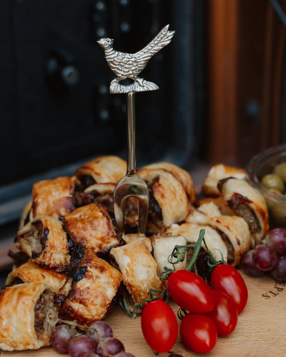 Bisley 3 Piece Stainless Steel Cheese Set on blurry background