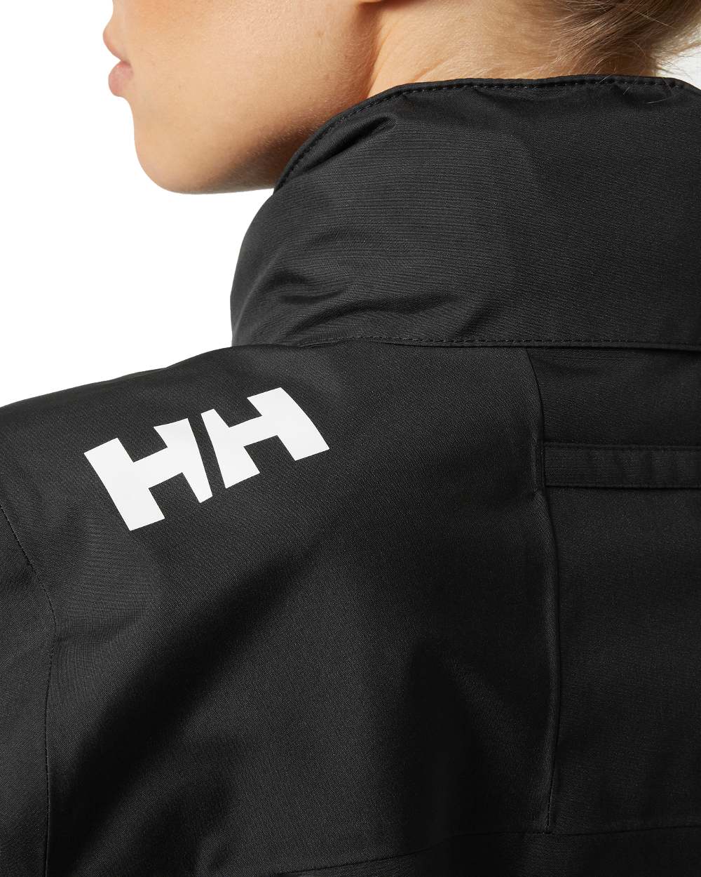 Black coloured Helly Hansen womens crew hooded sailing jacket 2.0 on white background 