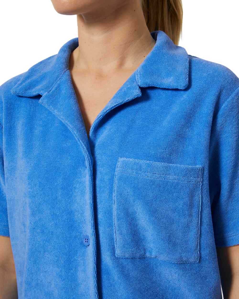 Ultra Blue coloured Helly Hansen womens siren towelling shirt on white background