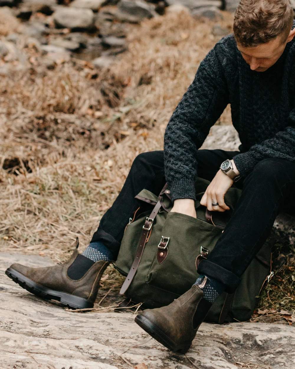 Dark Olive coloured Blundstone 1615 Classic Waxed Suede Chelsea Boots on forest background