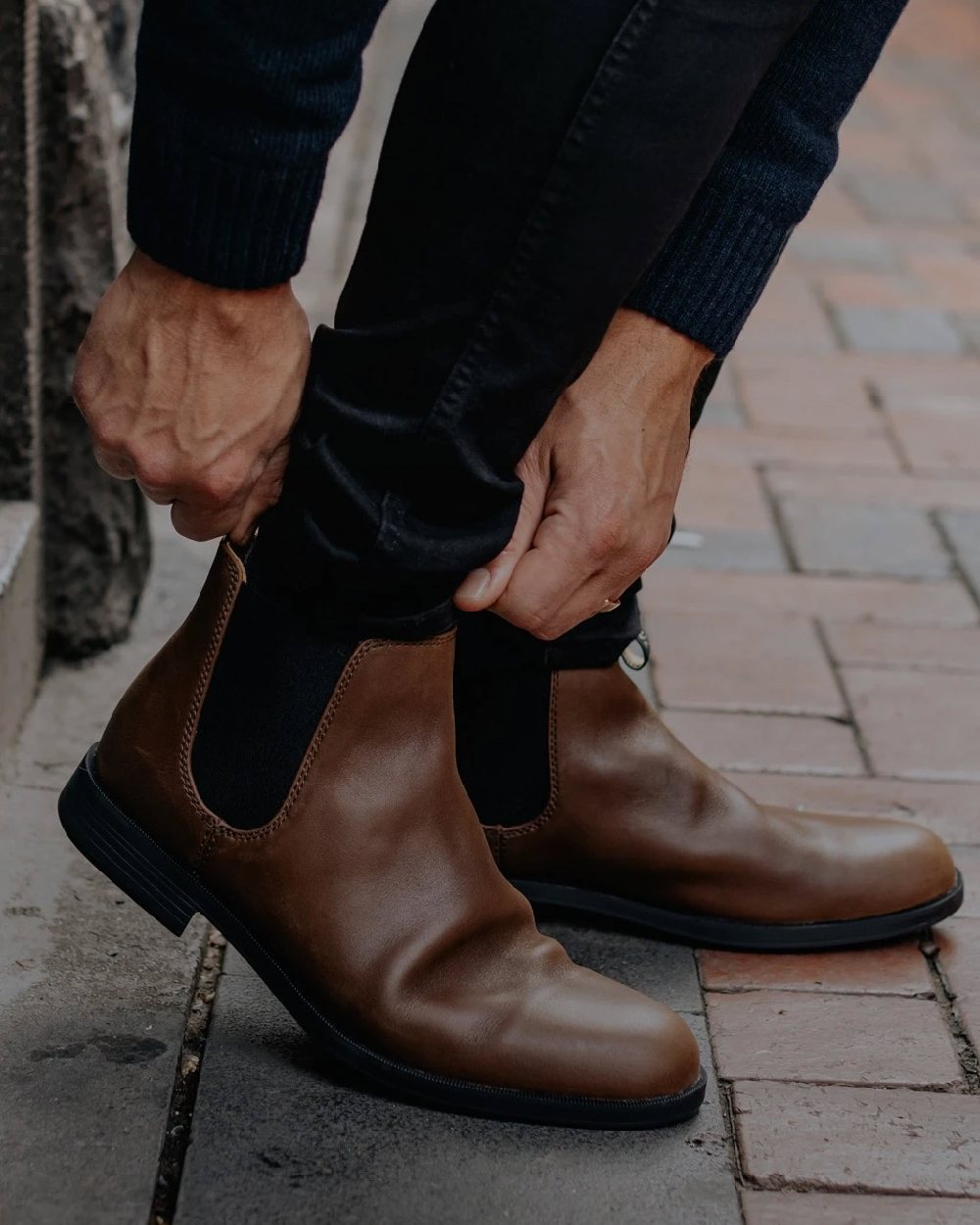 Chestnut Brown coloured Blundstone 1900 Chestnut Brown Dress Boots on street background