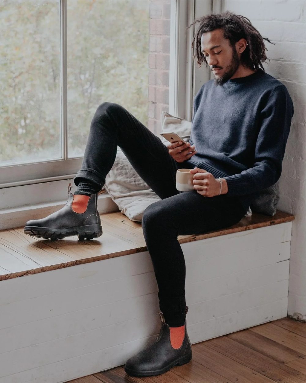 Brown Terracotta coloured Blundstone 1918 Brown Terracotta Chelsea Boots on window background