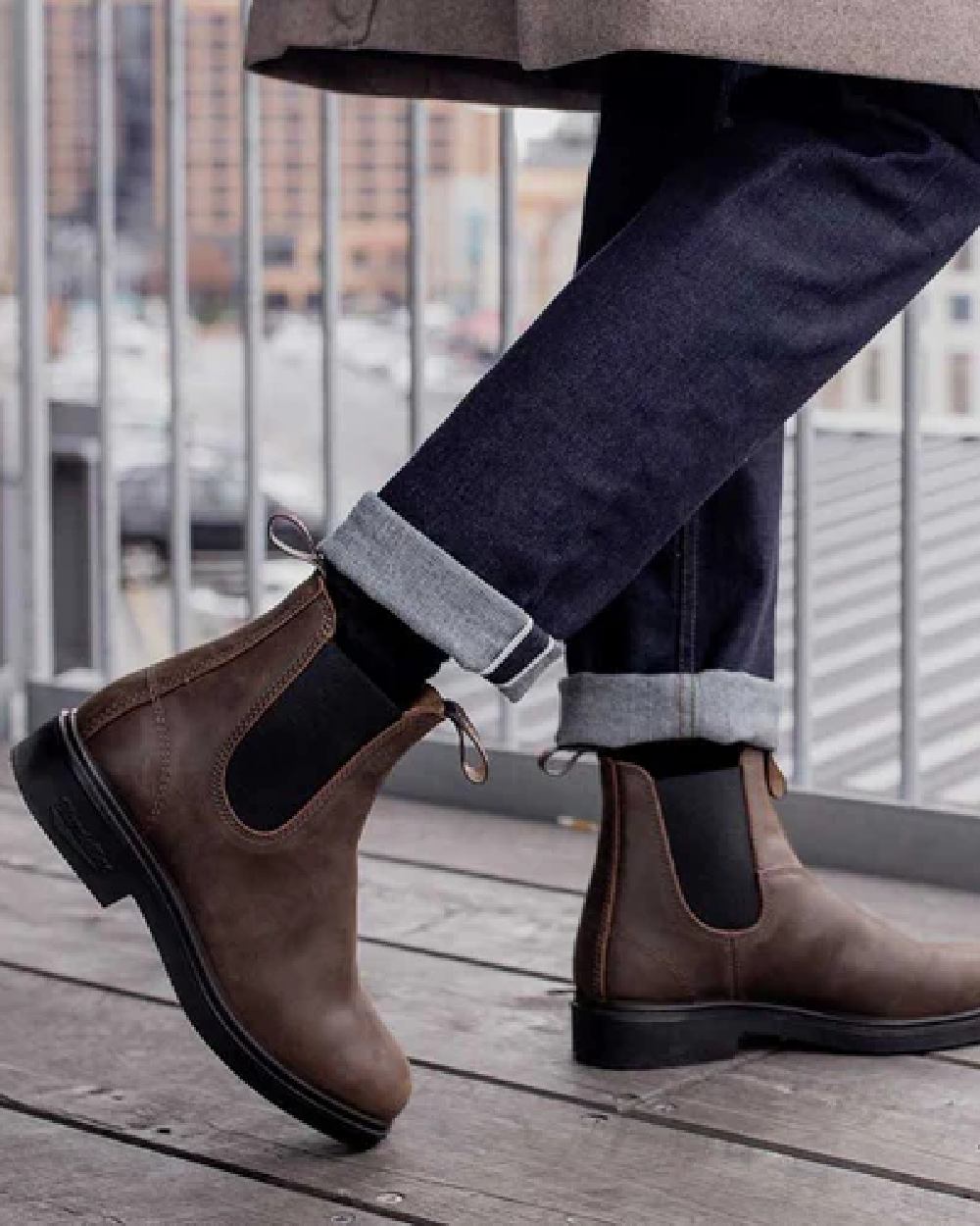Antique Brown coloured Blundstone 2029 Brown Leather Chelsea Boots on balcony background