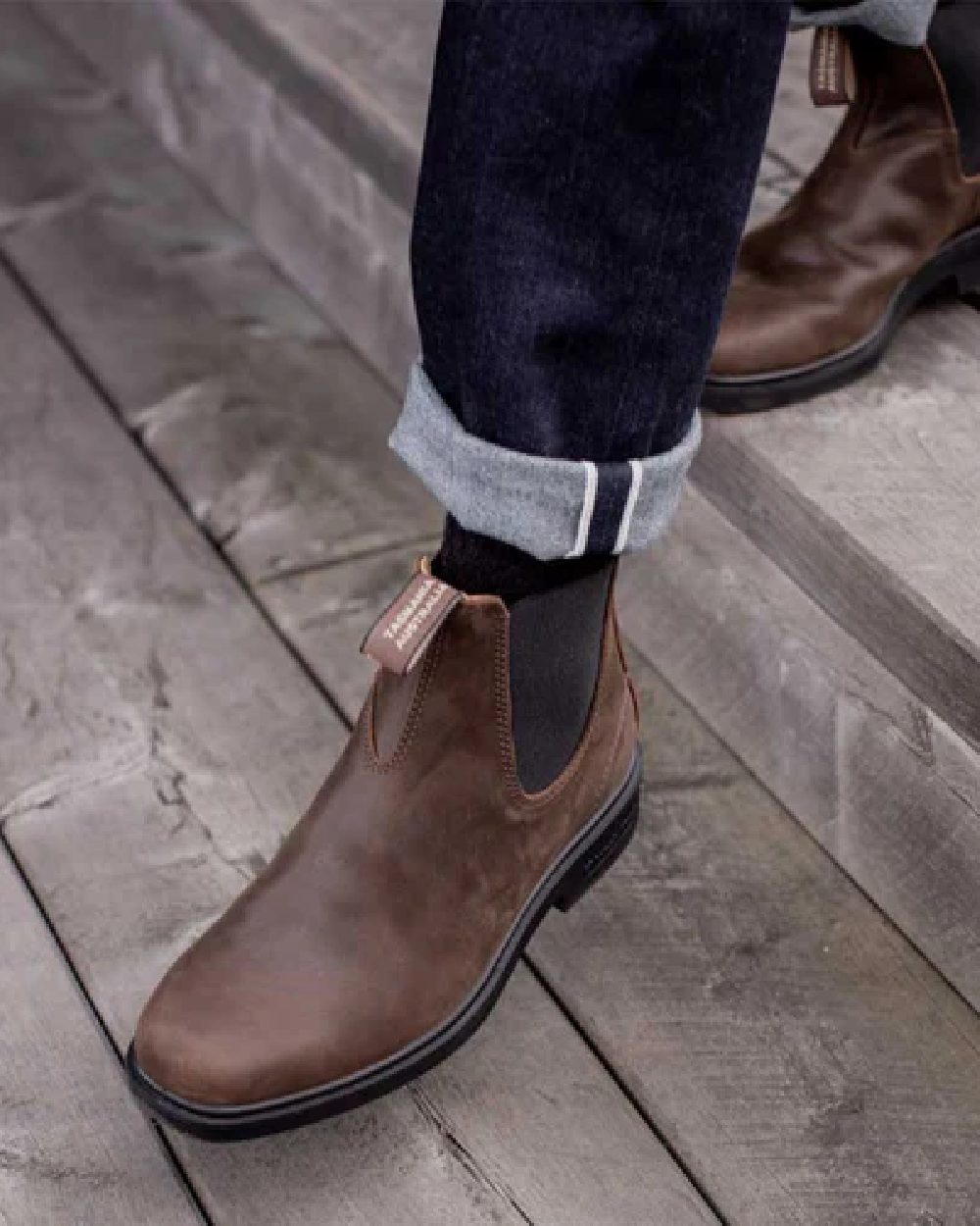 Antique Brown coloured Blundstone 2029 Brown Leather Chelsea Boots on steps background