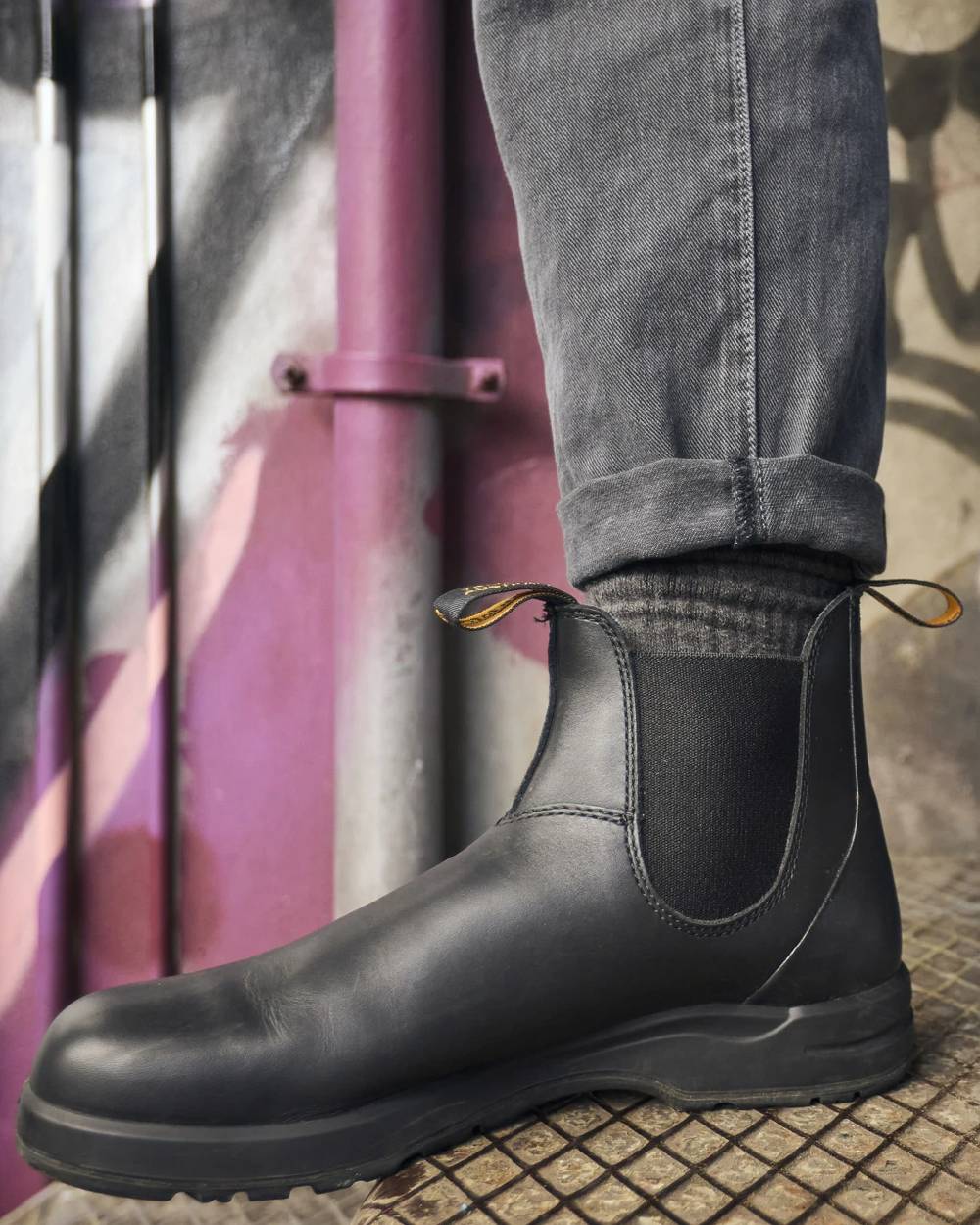 Black Coloured Blundstone 2058 Black Chelsea Boots on outdoor background