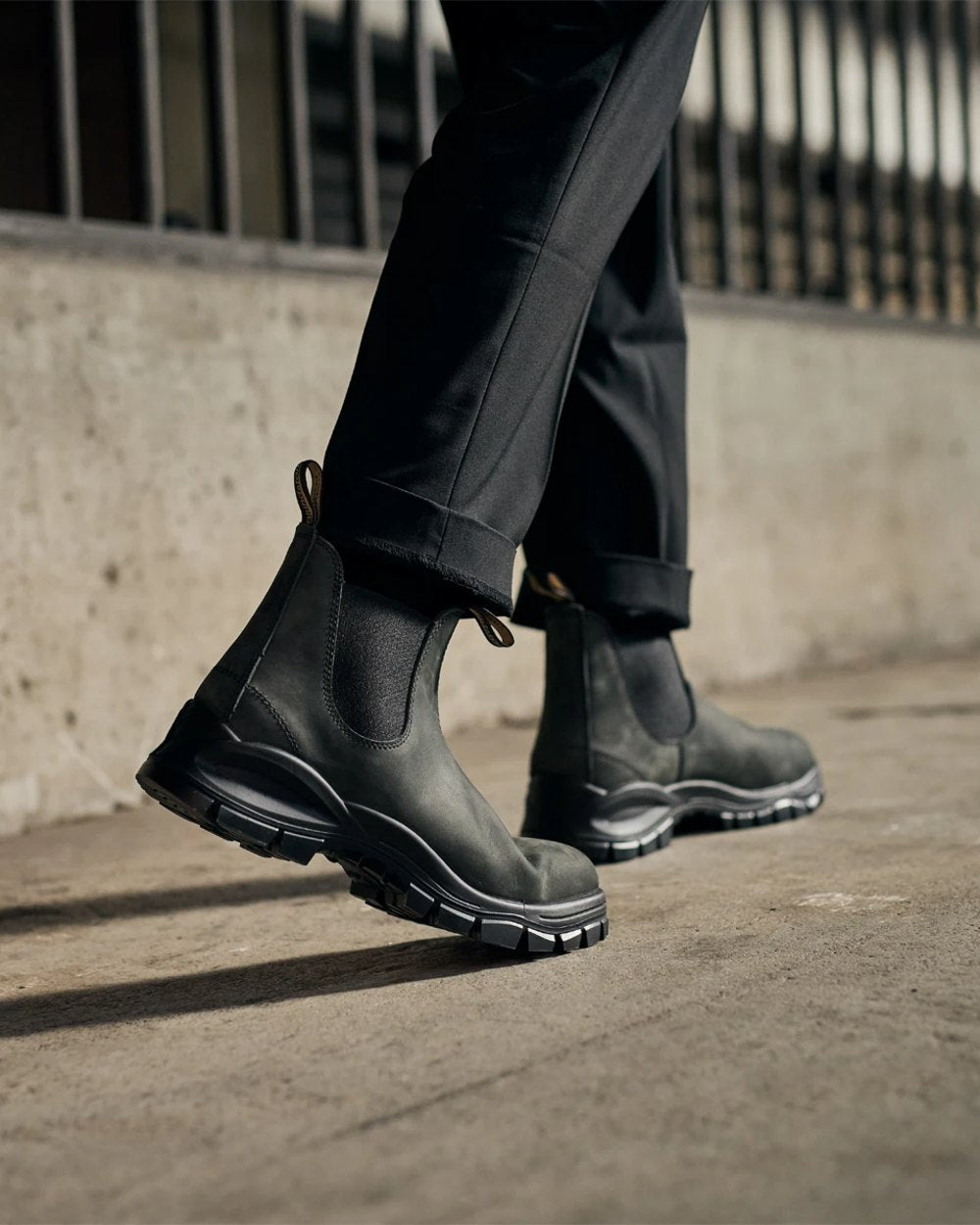 Rustic Black coloured Blundstone 2238 Leather Chelsea Boots on street background