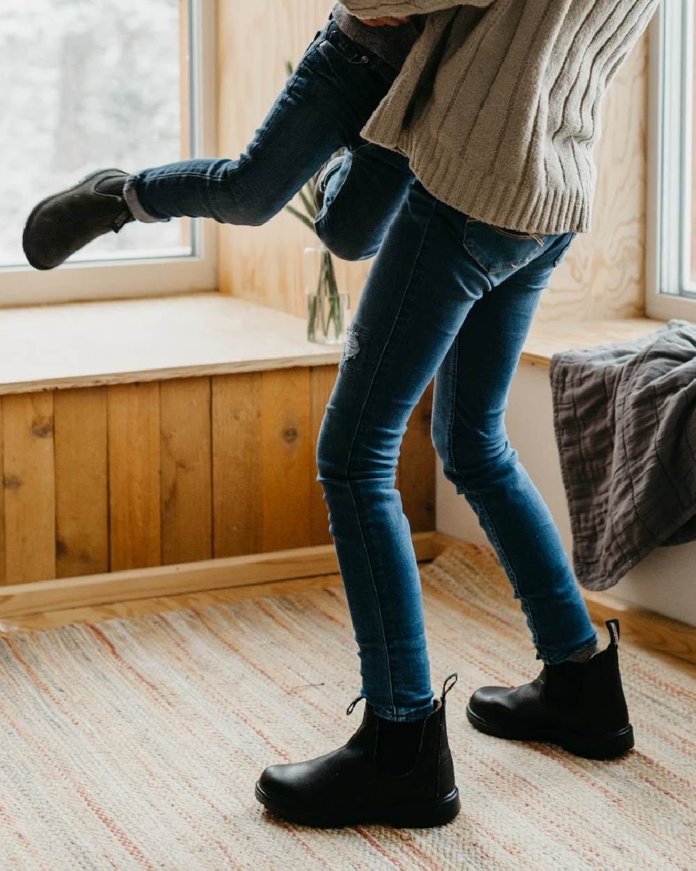 Black coloured Blundstone 510 Original Voltan Black Leather Boots on house background