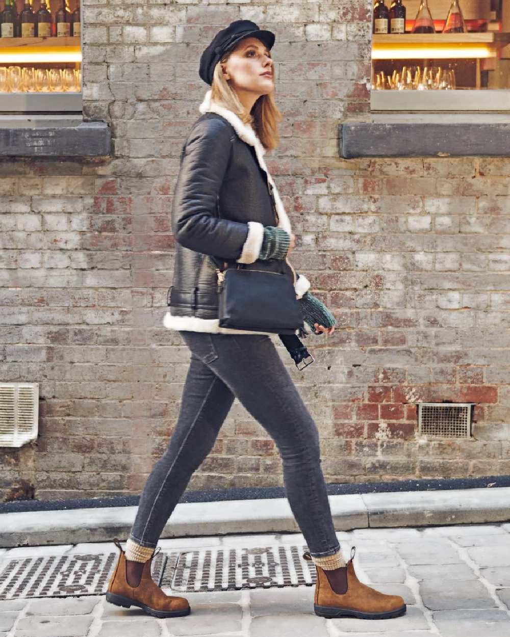 Saddle Brown coloured Blundstone 562 Saddle Brown Leather Boots on street background