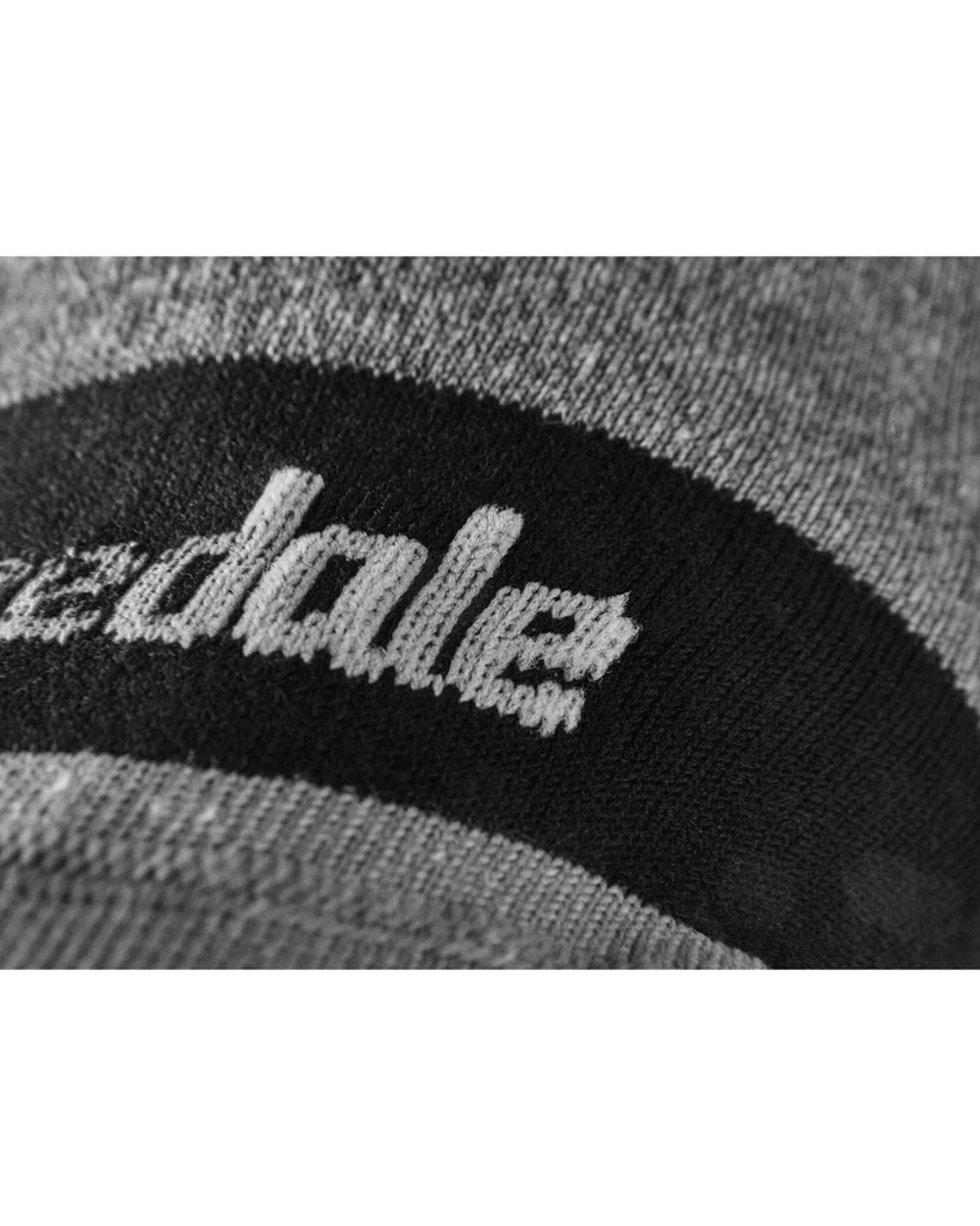 Grey coloured Bridgedale Base Layer Coolmax Socks on white background