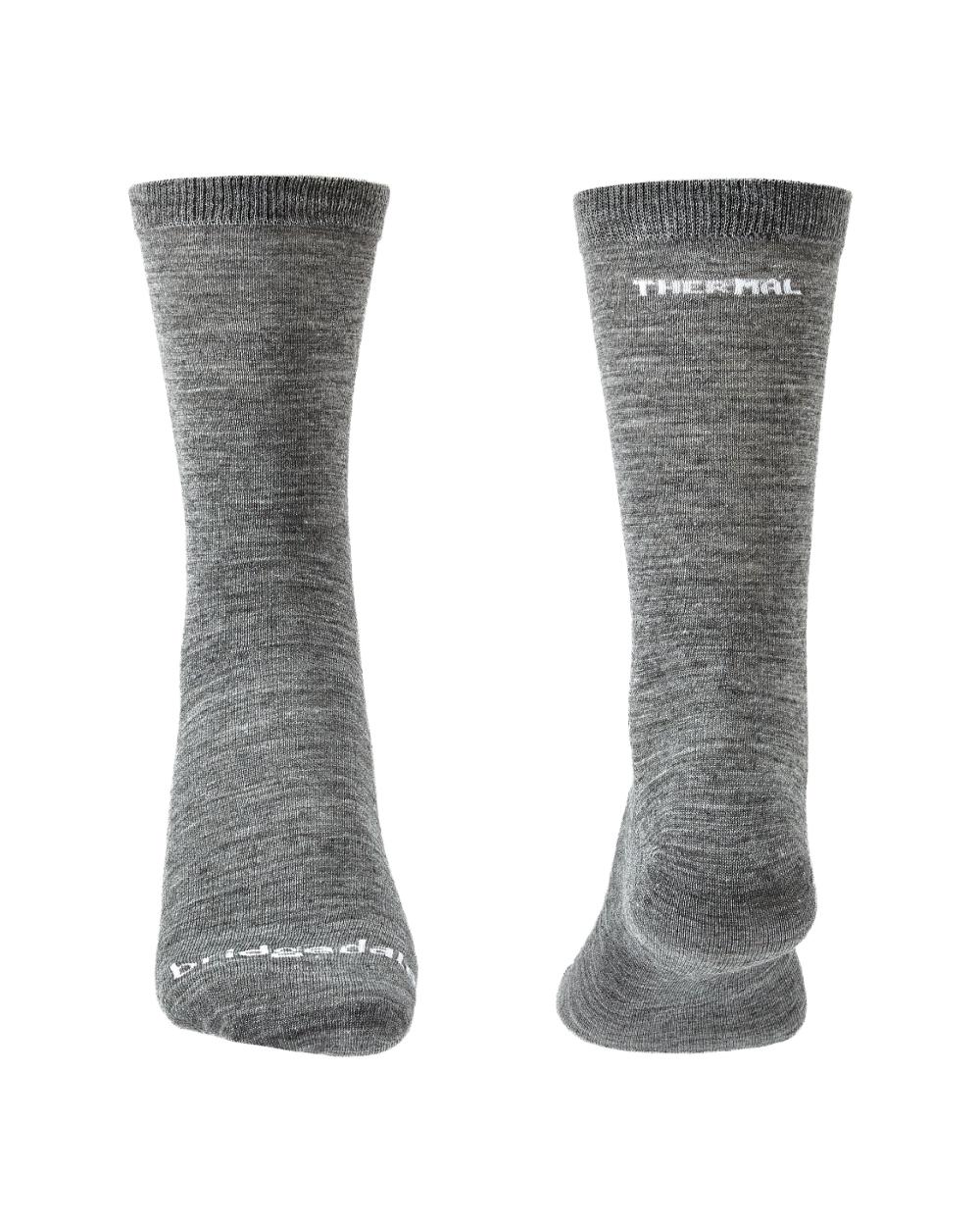 Grey coloured Bridgedale Base Layer Thermal Liner Socks on white background