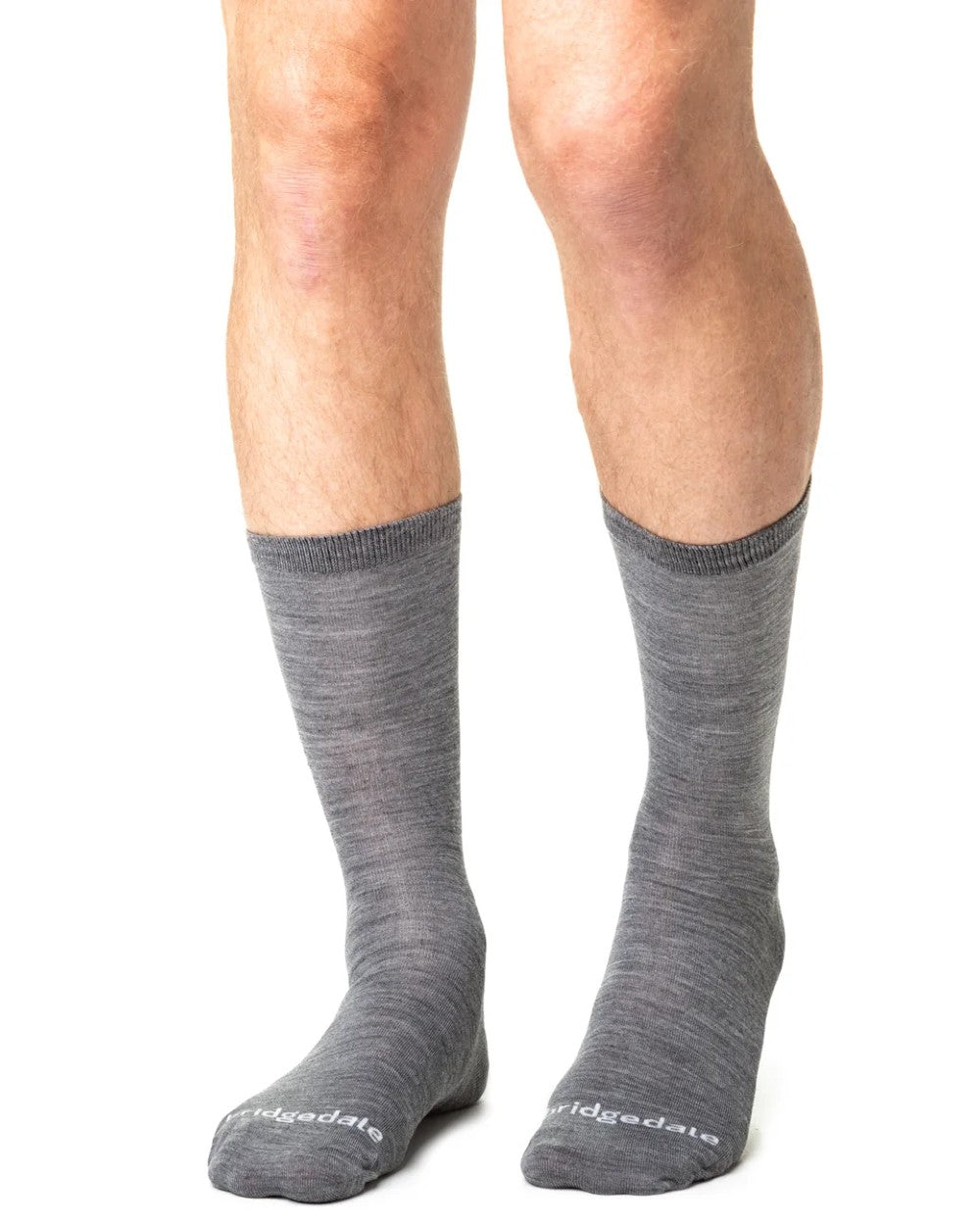 Grey coloured Bridgedale Base Layer Thermal Liner Socks on white background 