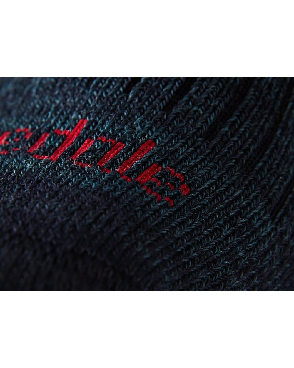 Navy coloured Bridgedale Hike Midweight Merino Comfort Socks on a white background