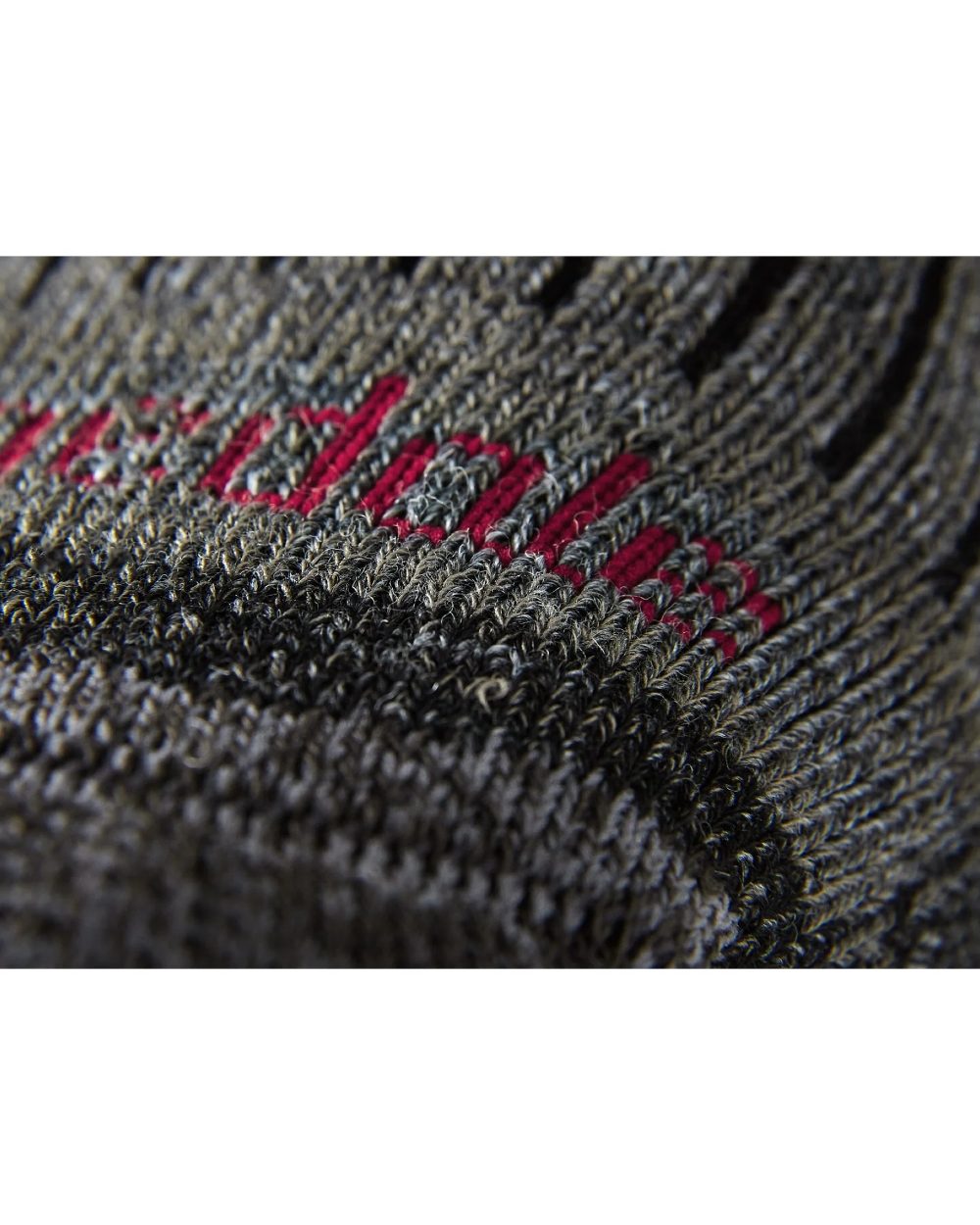 Charcoal coloured Bridgedale Hike Midweight Merino Comfort Socks on a white background