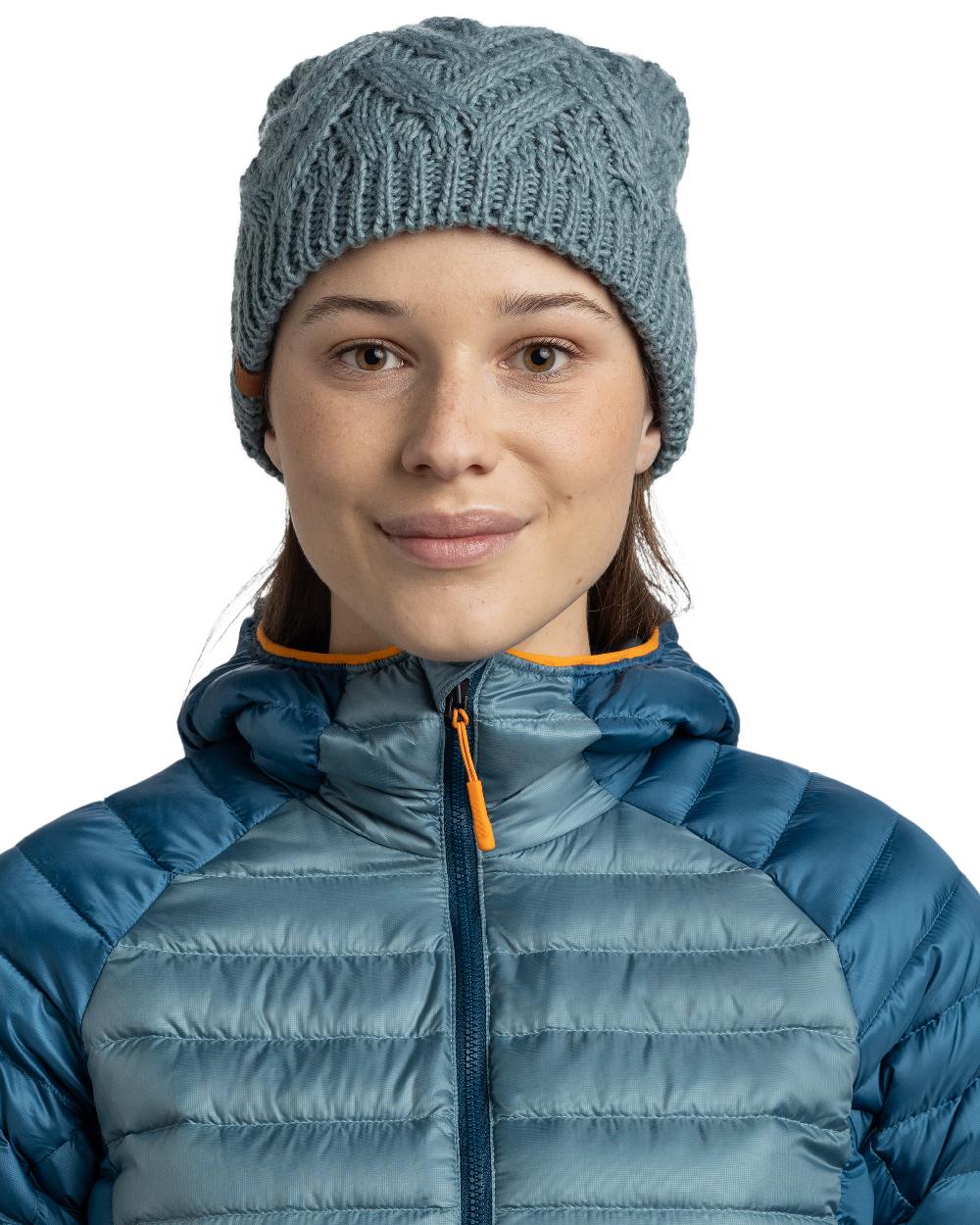 Blue Glass Coloured Buff Caryn Knitted And Fleece Band Beanie on white background