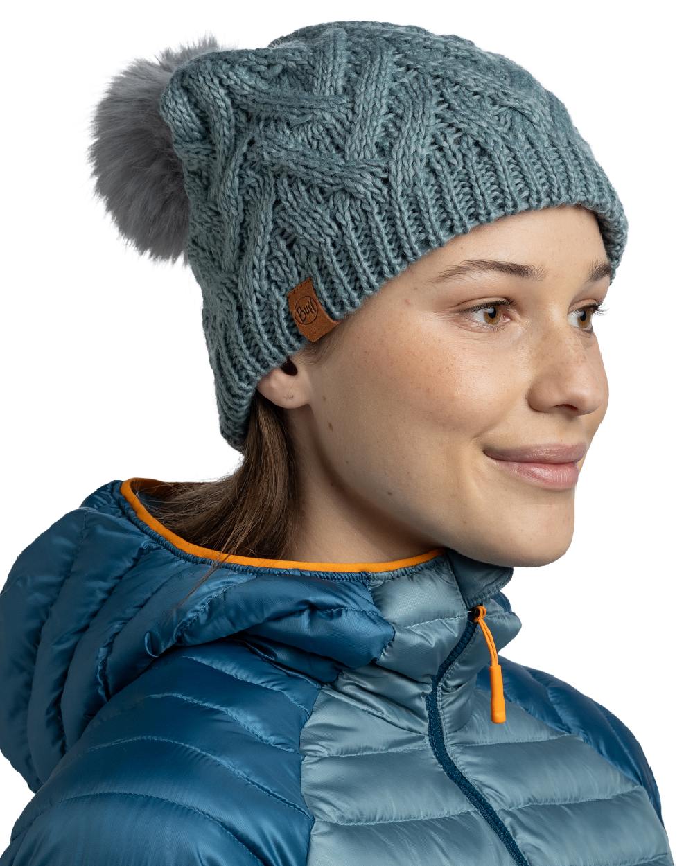 Blue Glass Coloured Buff Caryn Knitted And Fleece Band Beanie on white background