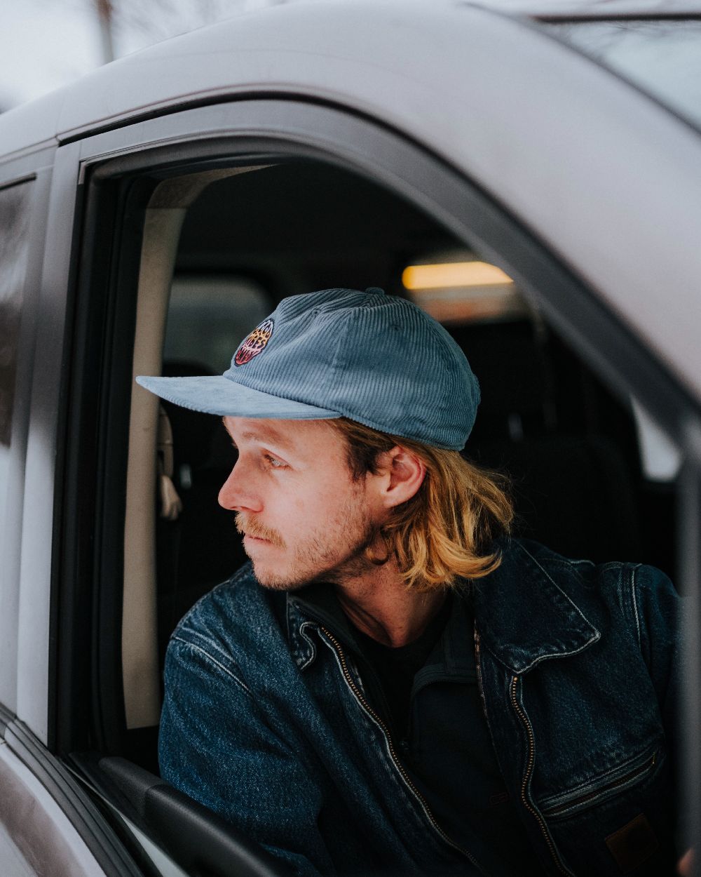 Water Coloured Buff Dister Chill Trucker Cap on car background