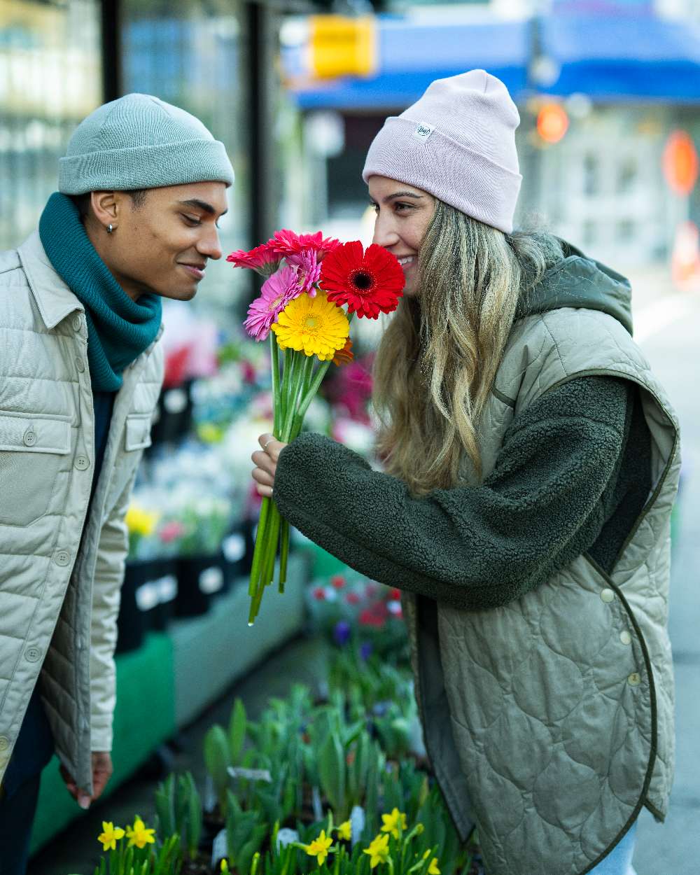 Rosewood Coloured Buff Linon Knitted Beanie on blurry background