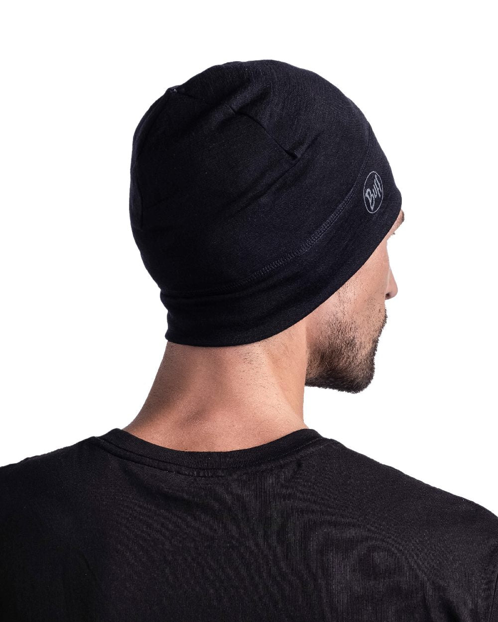 Black Coloured Buff Merino Lightweight Beanie on white background
