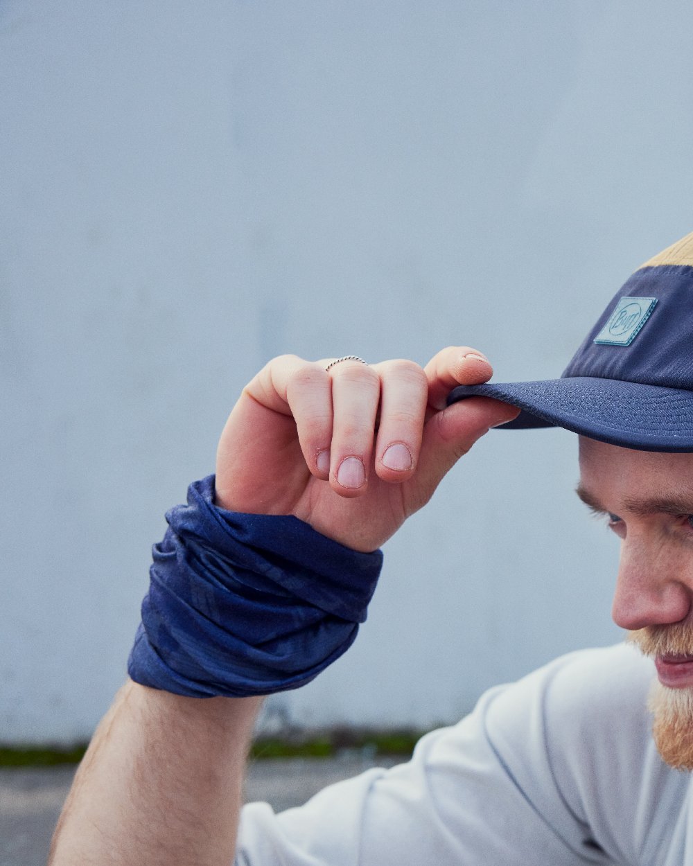 Night Blue Coloured Buff Merino Lightweight Neck Warmer on outdoor background