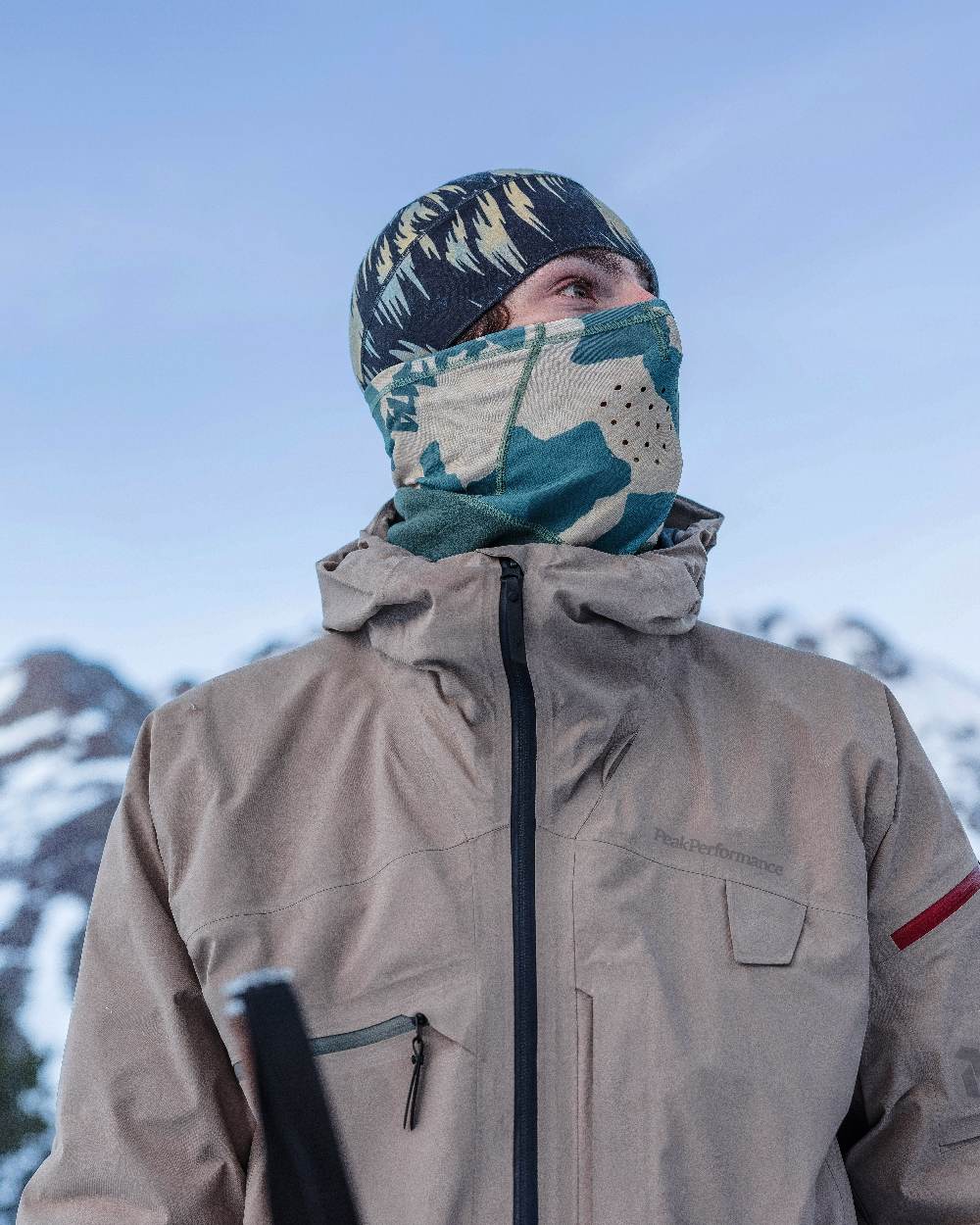 Silversage Coloured Buff Mountain Bandana on snow background
