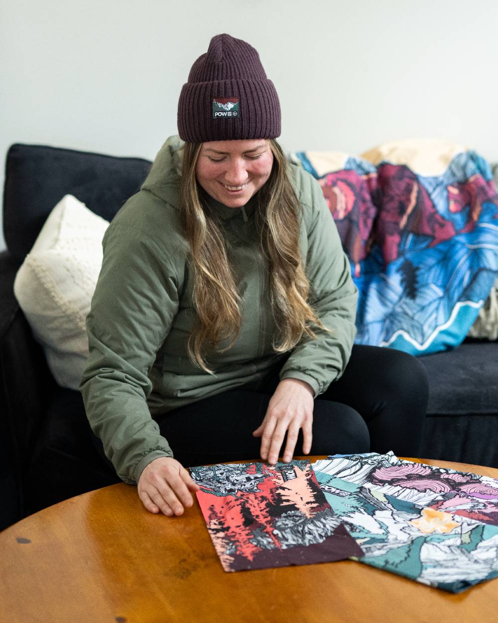 Purple Coloured Buff Rutger Pow Shadow Knitted Beanie on desk background