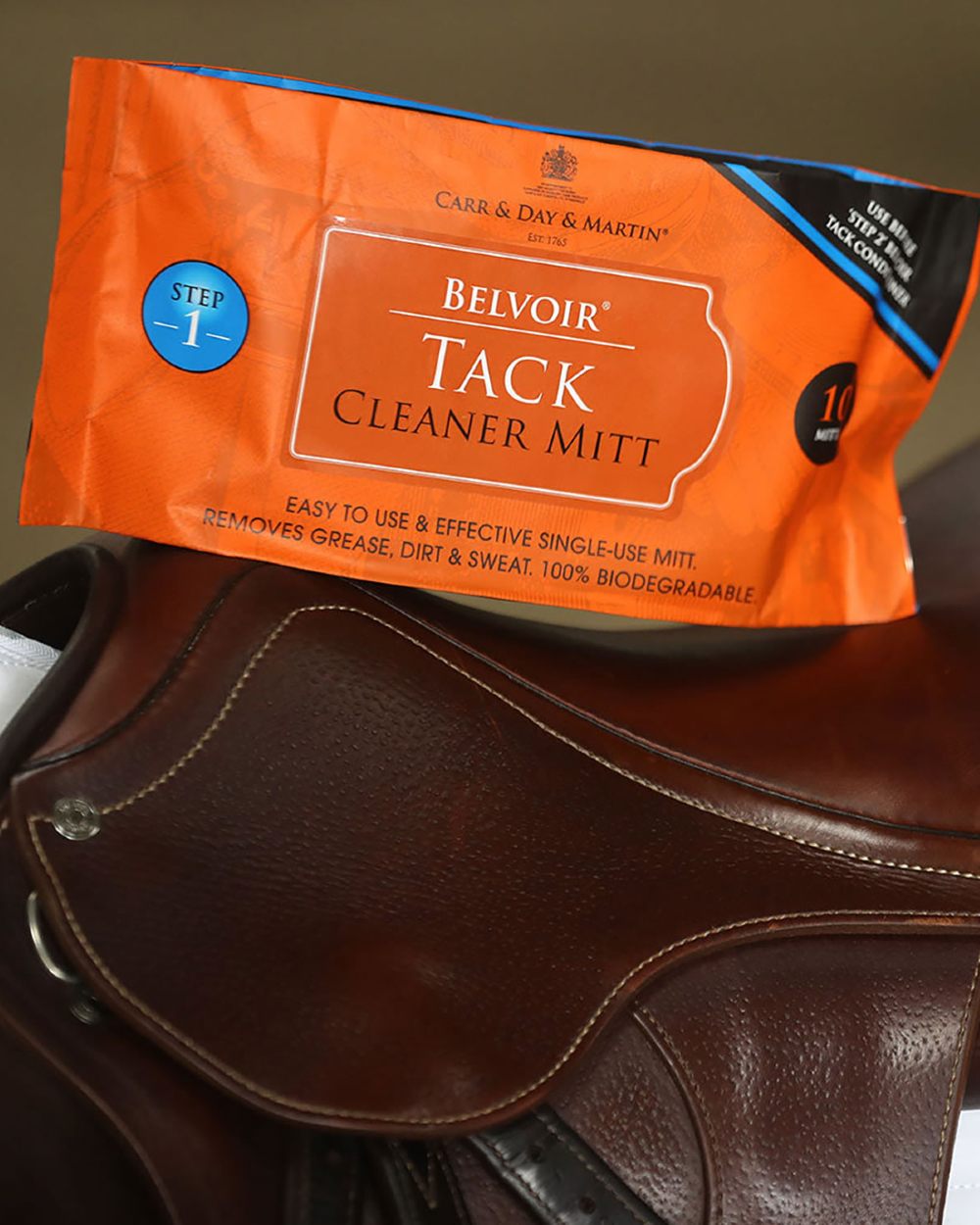 Carr & Day & Martin Belvoir tack Cleaning Mitt on saddle background