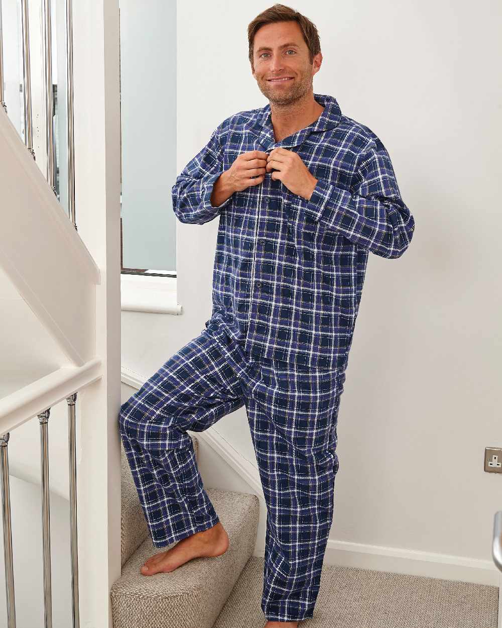 Blue coloured Champion Cambridge Cotton Pyjamas on wall background