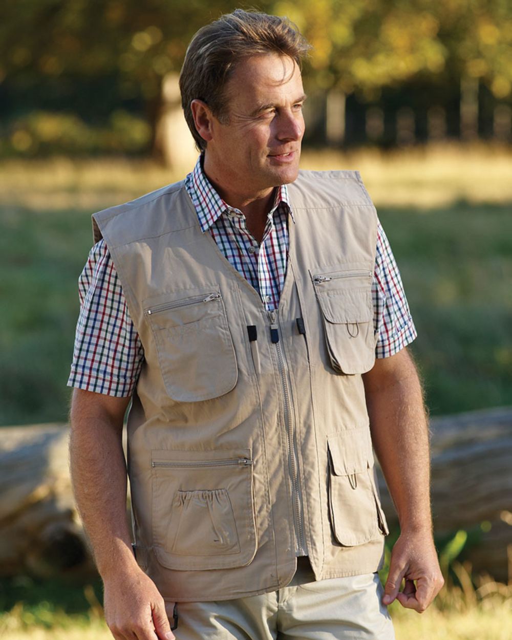 Stone coloured Champion Dale Gilet on a blurry park background