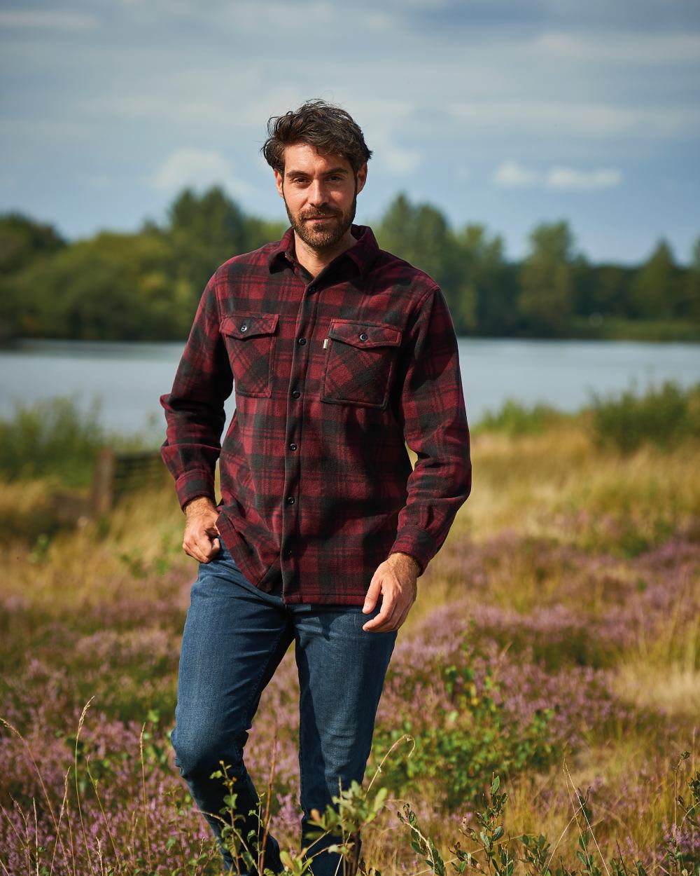 Red coloured Champion Eskdale Fleece Lined Shirt on river background