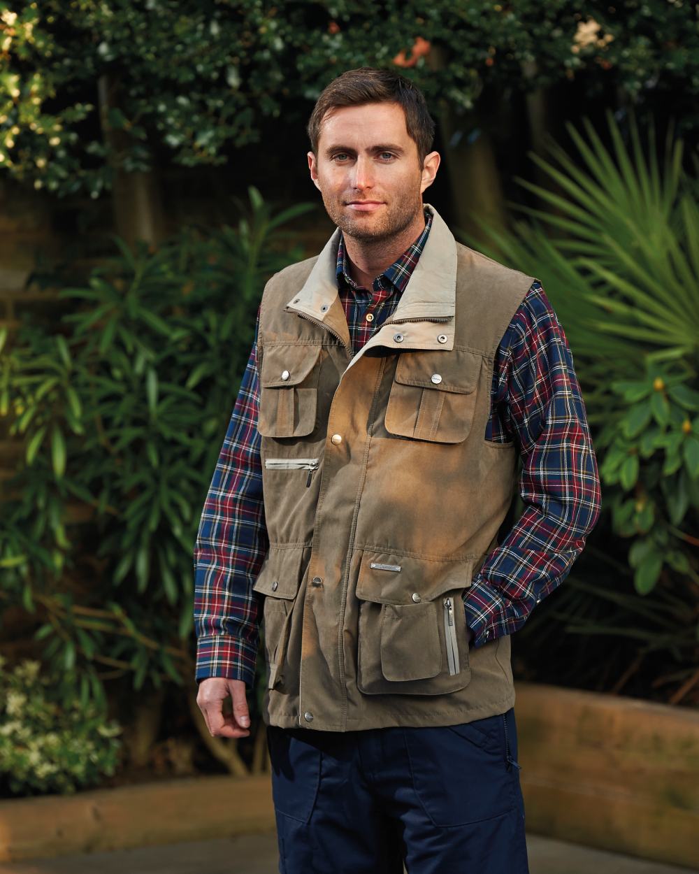 Taupe coloured Champion Farnham Gilet on backyard background