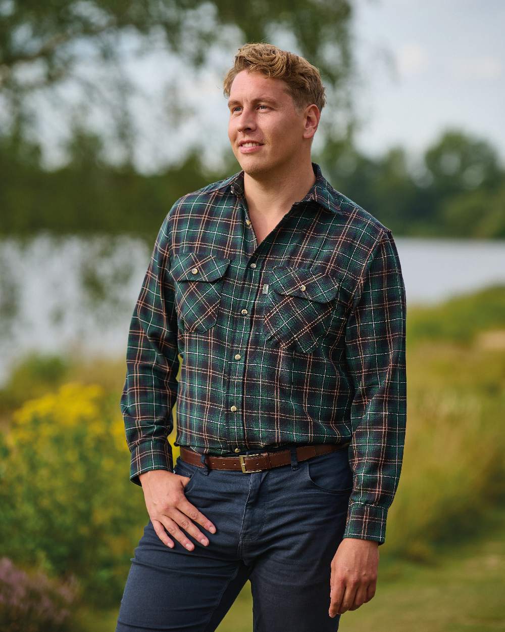 Green coloured Champion Kilbeggan Tartan Shirt on pond background