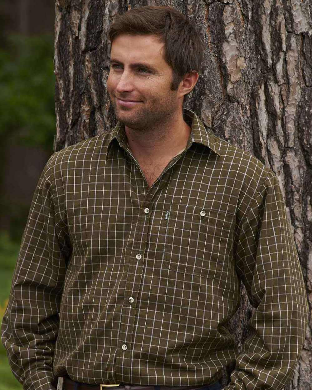 Green coloured Champion Milton Micro Fleece Lined Shirt on tree background