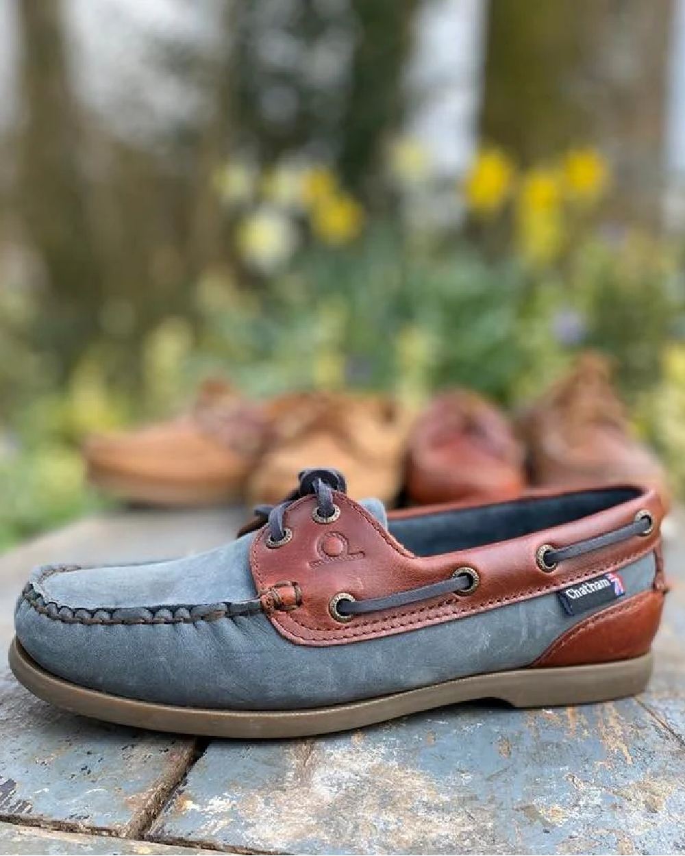 Navy Seahorse Coloured Chatham Womens Bermuda G2 Leather Boat Shoes on blurry background