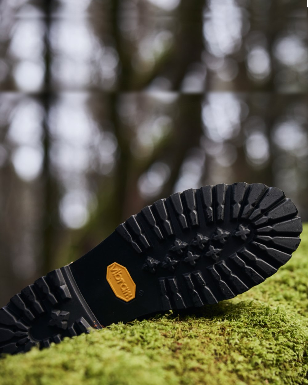 Chocolate Coloured Chatham Womens Olympia II-Premium Leather Waterproof Chelsea Boots on blurry background