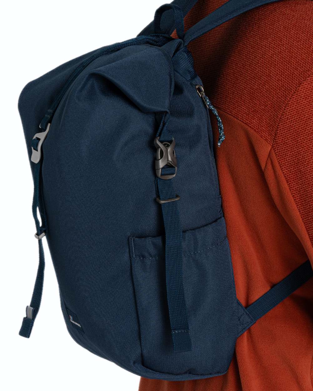 Blue Stone coloured Craghoppers 16L Kiwi Classic Rolltop II Backpack on white background