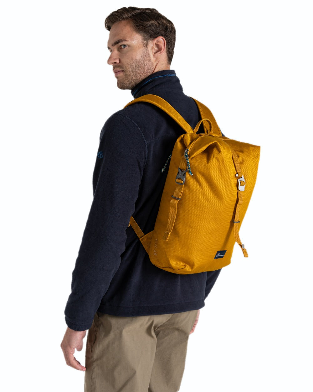 Dark Butterscotch coloured Craghoppers 16L Kiwi Classic Rolltop II Backpack on white background