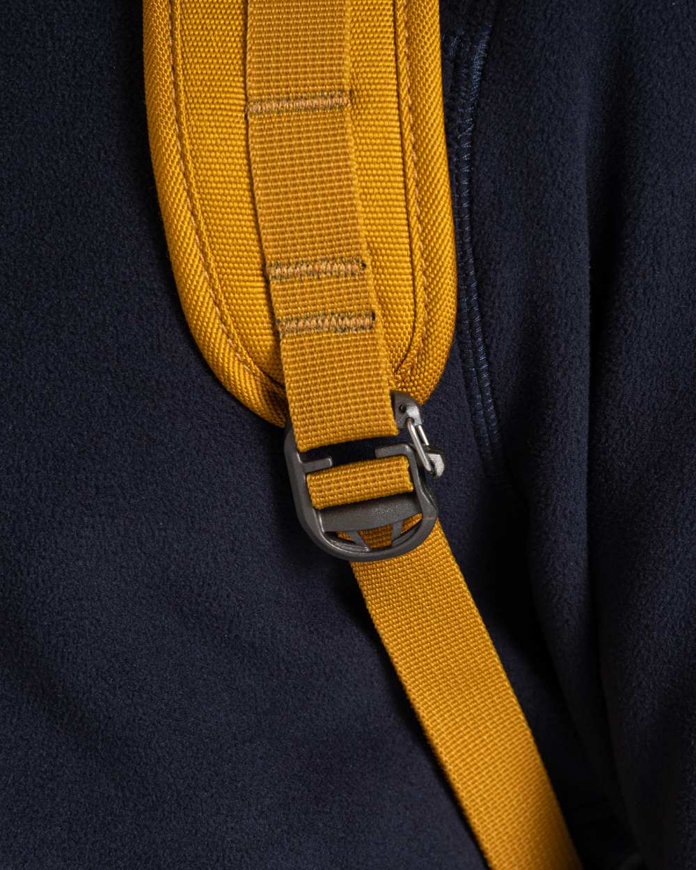 Dark Butterscotch coloured Craghoppers 16L Kiwi Classic Rolltop II Backpack on white background