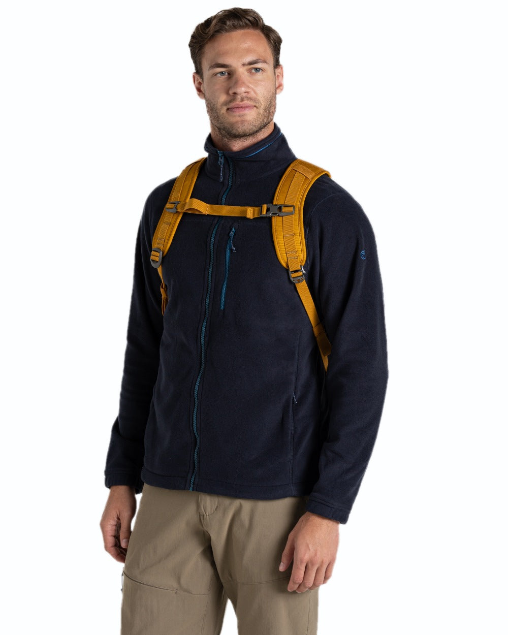 Dark Butterscotch coloured Craghoppers 16L Kiwi Classic Rolltop II Backpack on white background