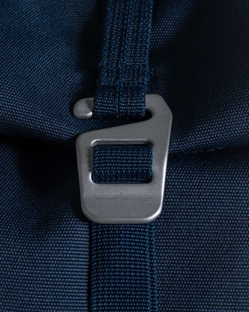 Blue Stone coloured Craghoppers 20L Kiwi Classic Rolltop Backpack II on white background