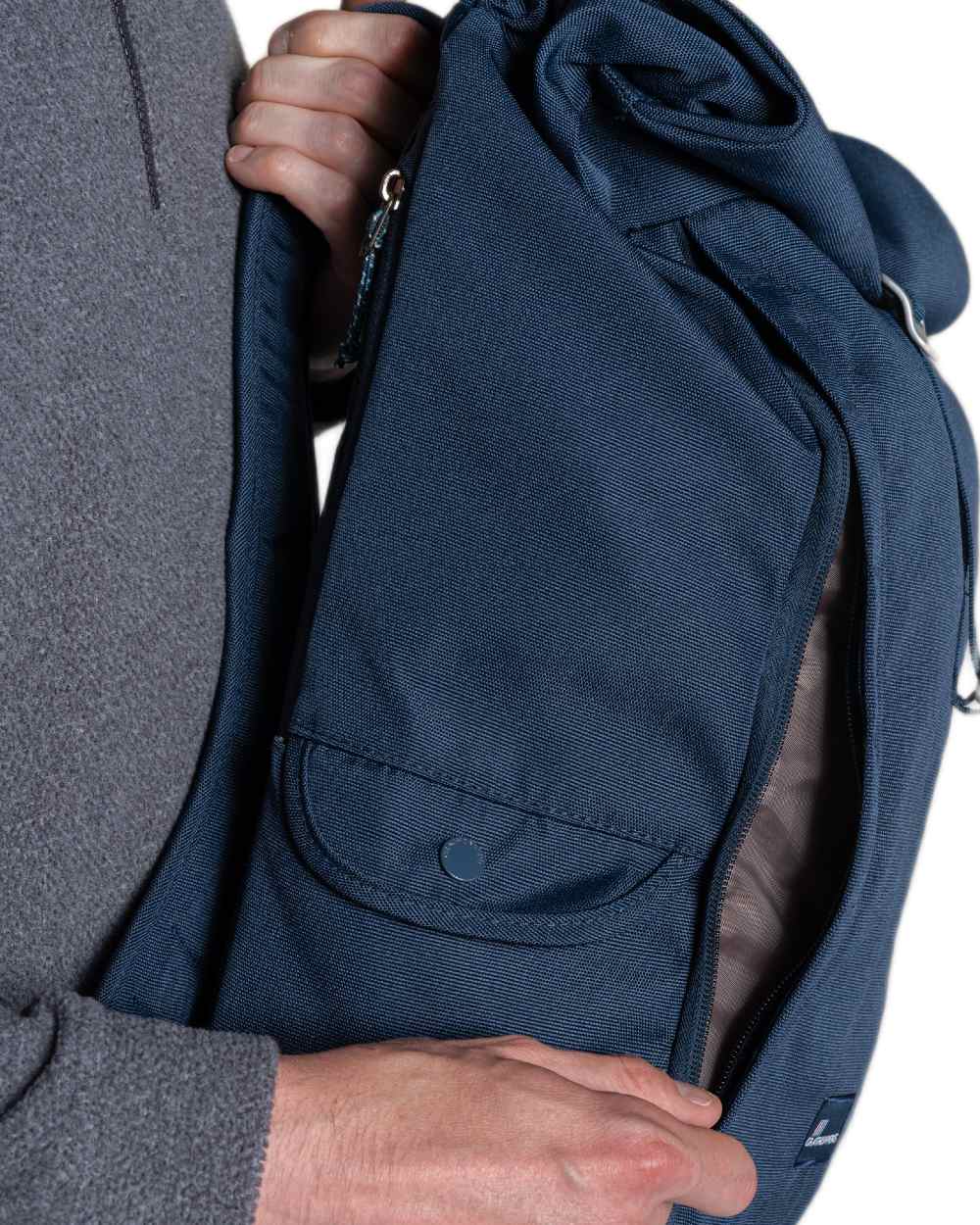 Blue Stone coloured Craghoppers 20L Kiwi Classic Rolltop Backpack II on white background