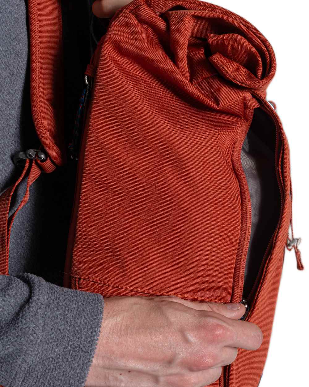 Red Beach coloured Craghoppers 20L Kiwi Classic Rolltop Backpack II on white background