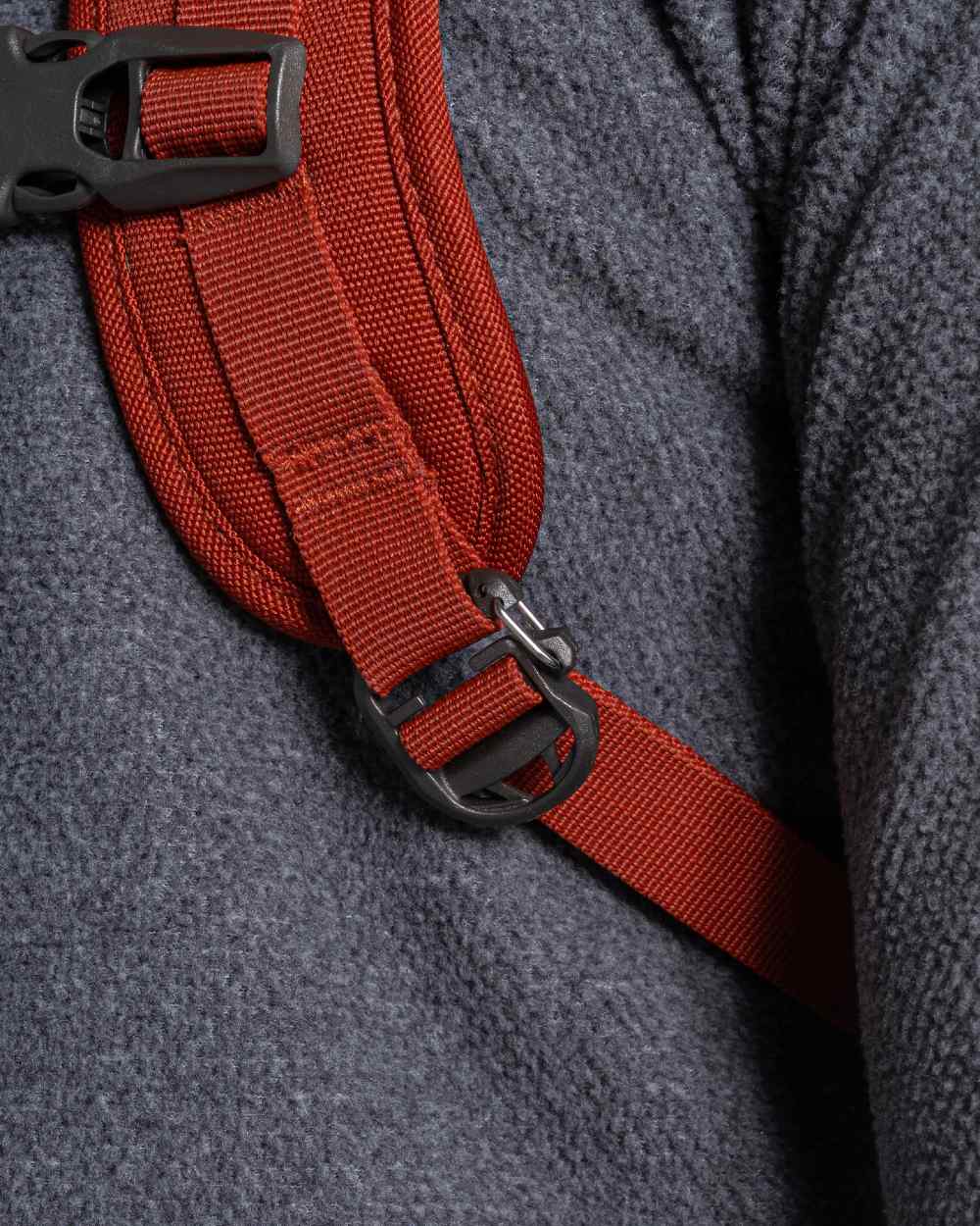 Red Beach coloured Craghoppers 20L Kiwi Classic Rolltop Backpack II on white background