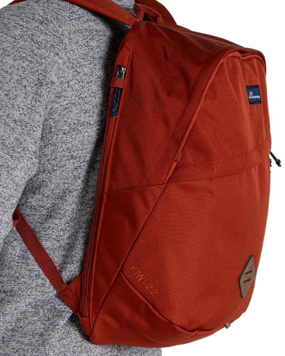 Red Beach coloured Craghoppers 22L Kiwi Classic Backpack II on white background
