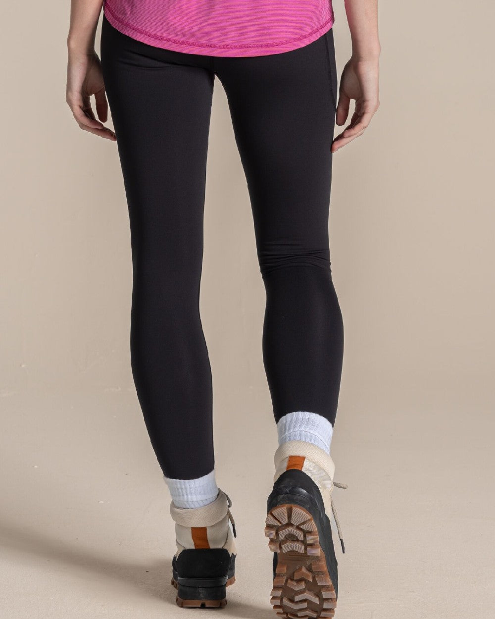 Black coloured Craghoppers Alex II Legging on beige background