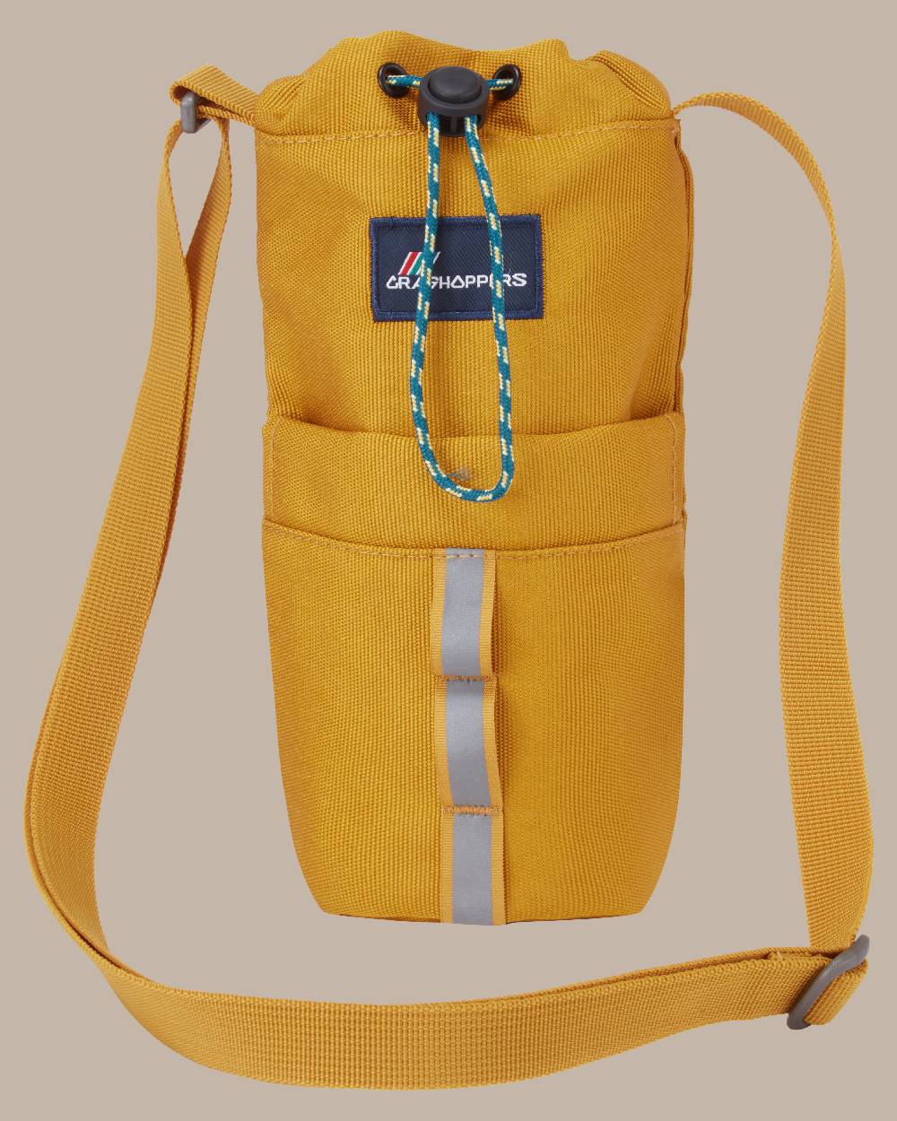 Dark Butterscotch Coloured Craghoppers kiwi Bottle Bag II On Beige Background