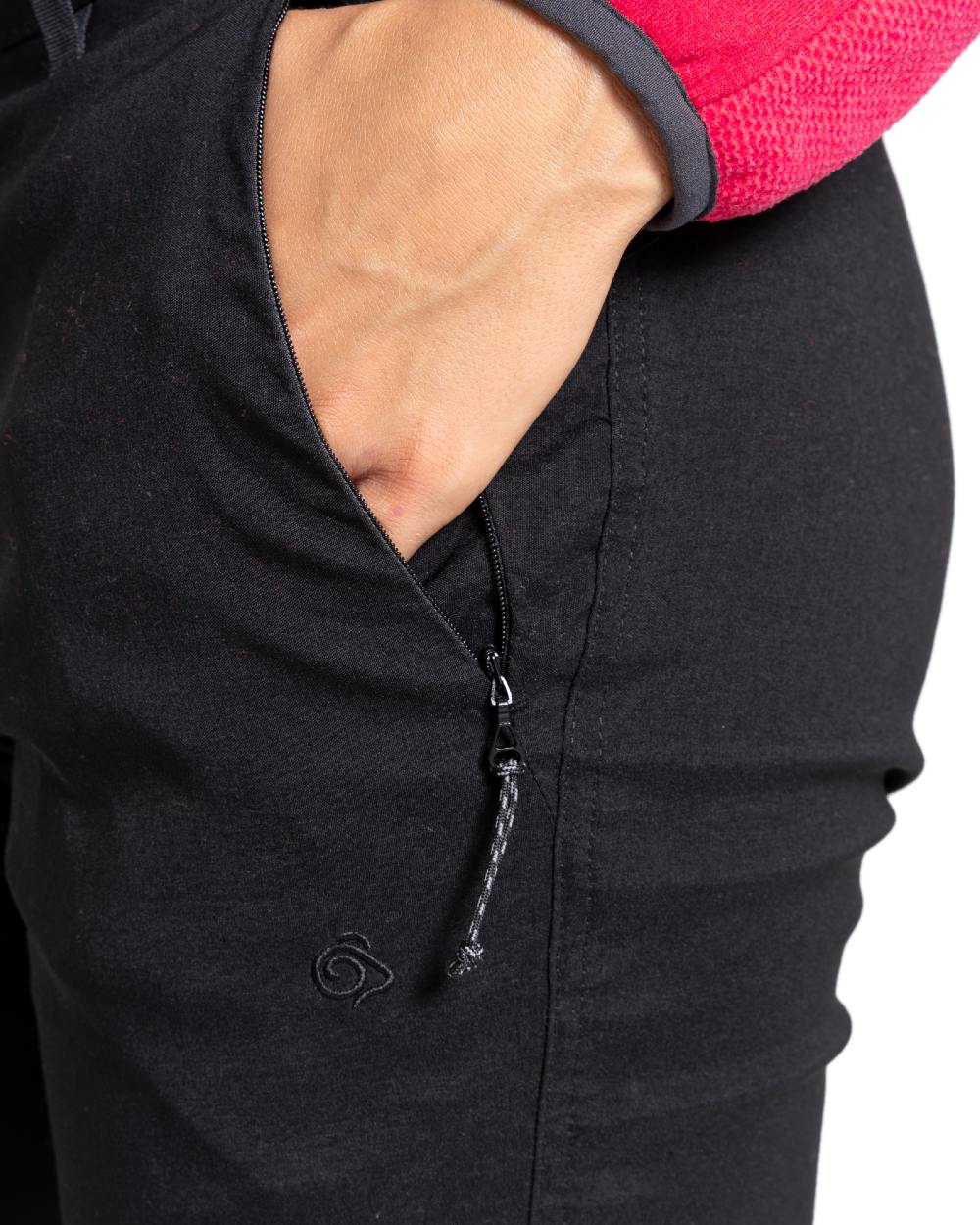 Black coloured Craghoppers Kiwi Pro Crop II Trousers on white background