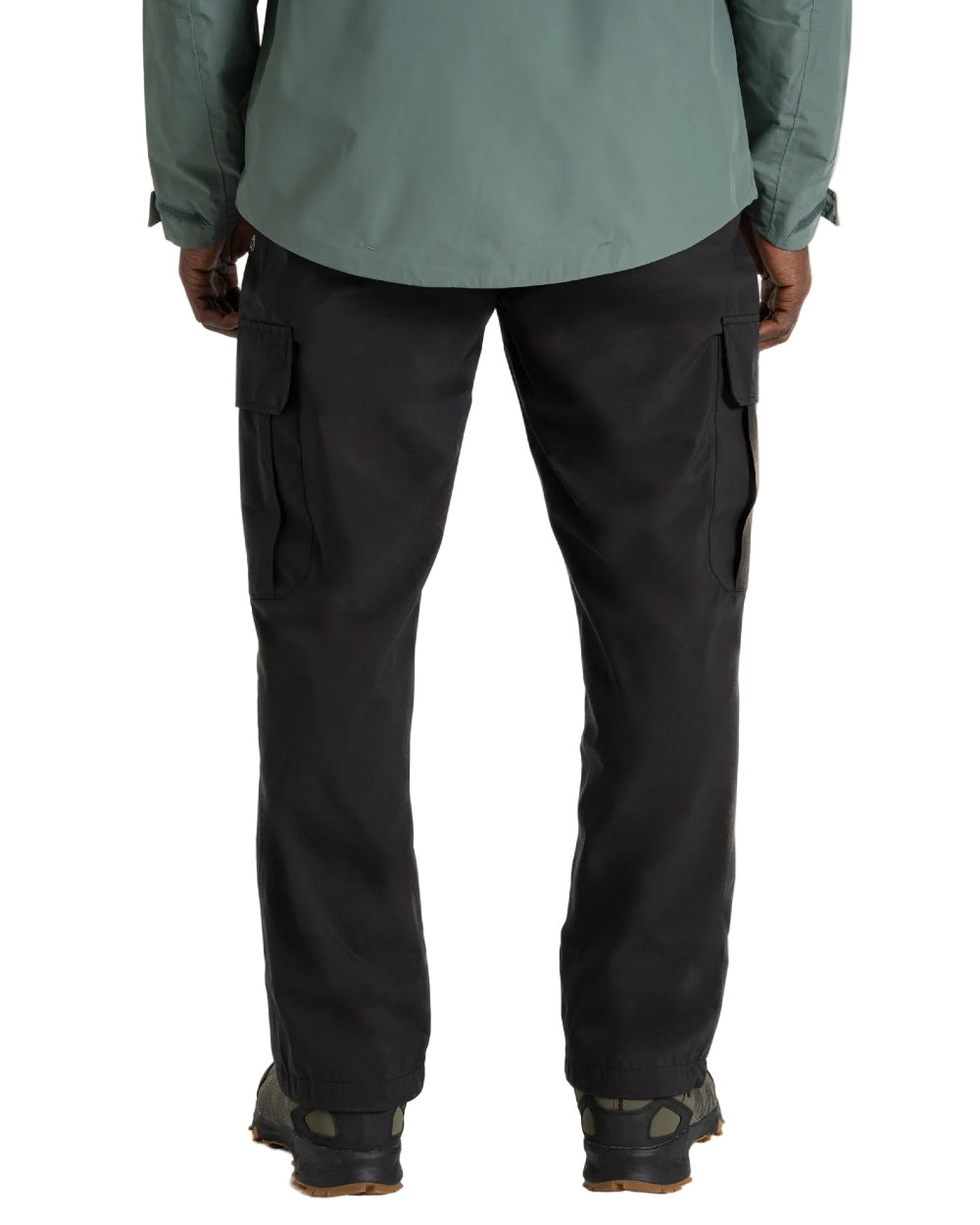Black coloured Craghoppers Mens Indus Waterproof Lightweight Cargo Trousers on white background