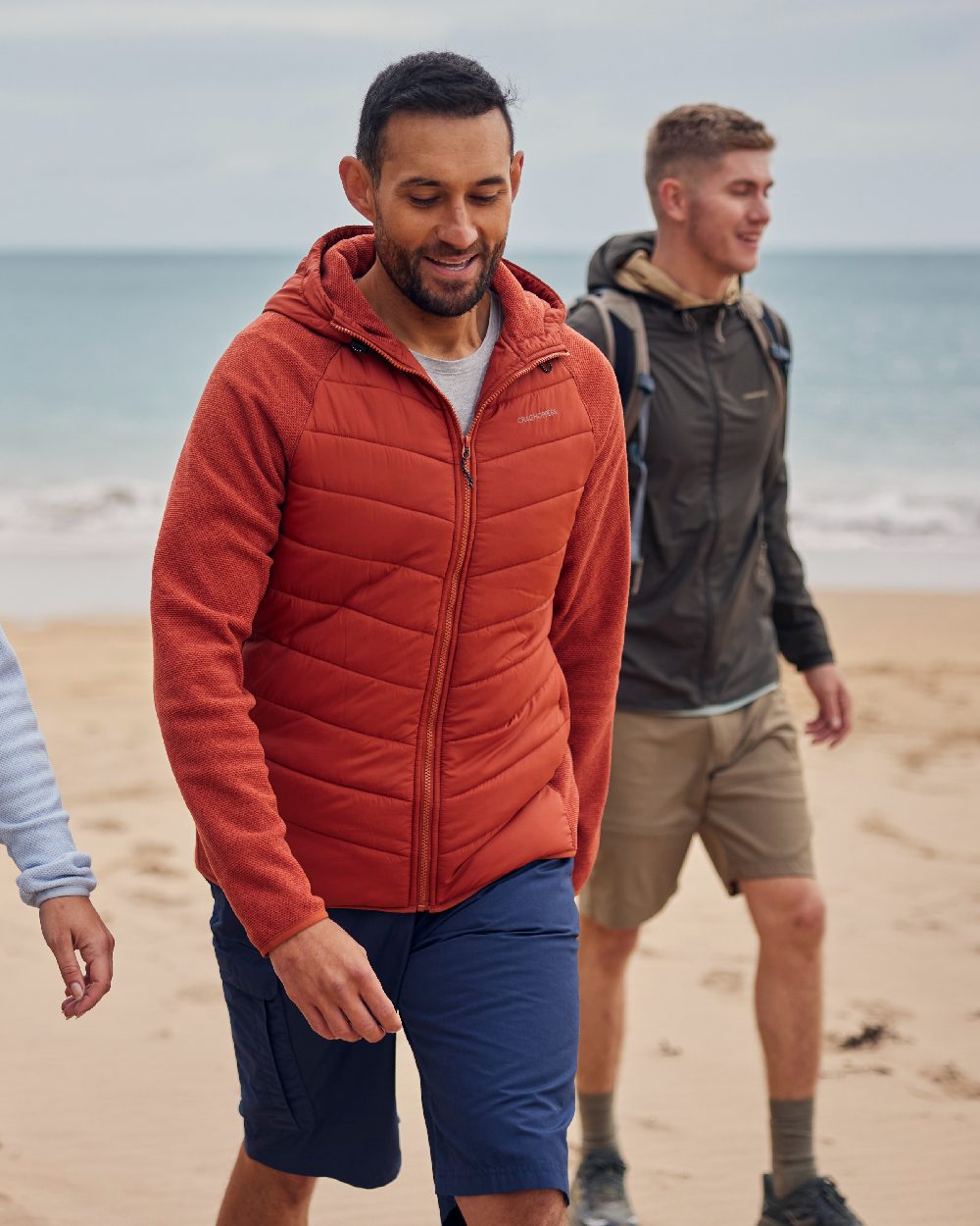Steel Blue coloured Craghoppers Mens Kiwi Recycled Long Short on beach background